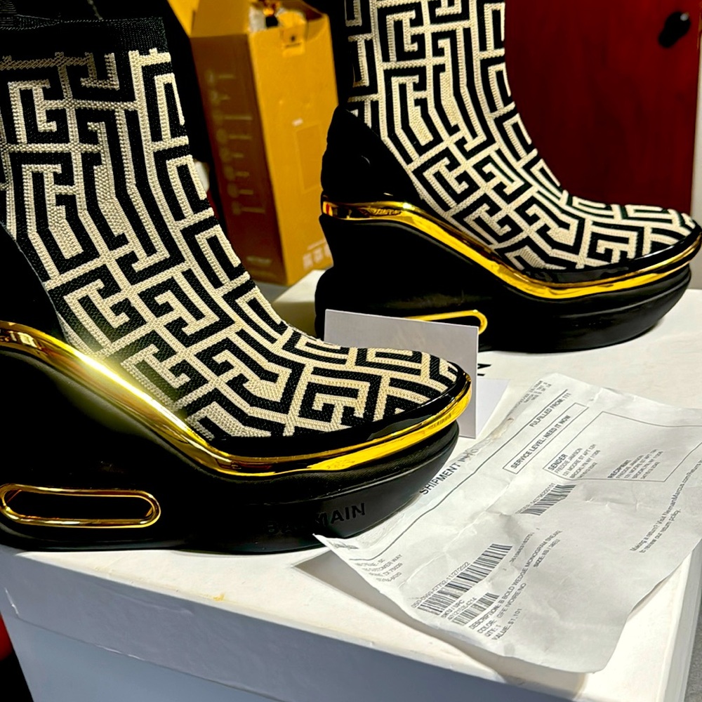 This is a Balmain monogram sneaker with thick wedge size 8 true to size
